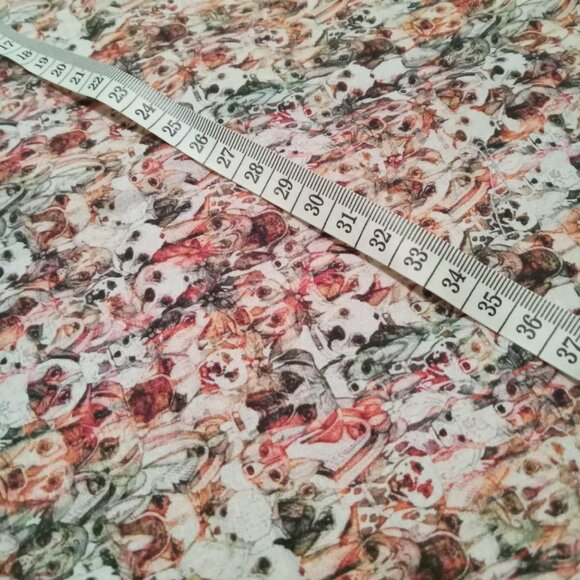 Fabrics with optical illusion pattern featuring dog heads - Picture 3 of 3